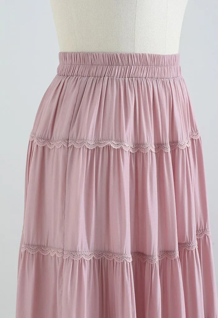 Midirock mit überbackener Spitze und Plissee und Rüschen in Rosa